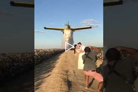 Photographer gets the perfect wedding shot with a plane!
