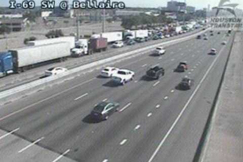 Overturned 18-wheeler closes Southwest Freeway in Houston