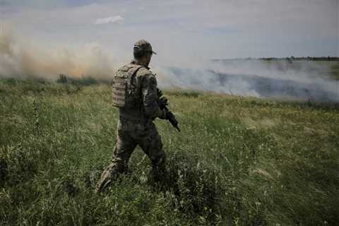 Russia Current war in Ukraine: Dead Putin soldiers line the street in a Ukrainian village..