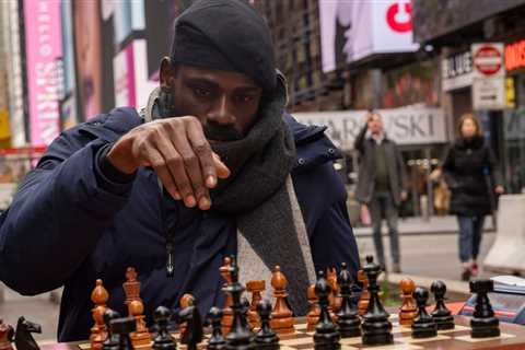 Chess master plays 6-hour marathon to break record – and raise money for children's education | ..
