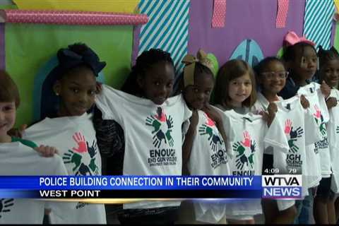 West Point police officers bonding with local kids through free shirts